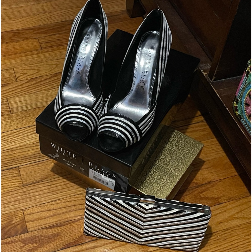 Black and white peep toe heels with matching purse . Size 7.5 Only used 1 time